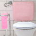pink toilet with pink toilet paper