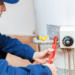 plumber repairing hot water heater