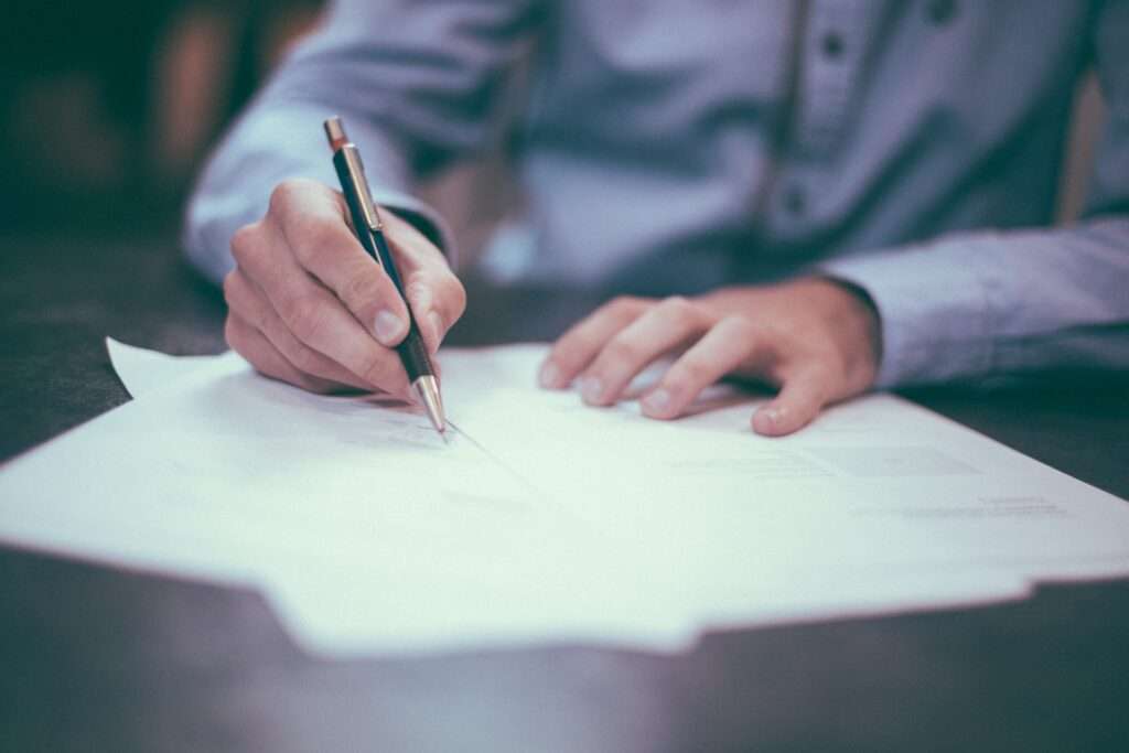 man with paperwork