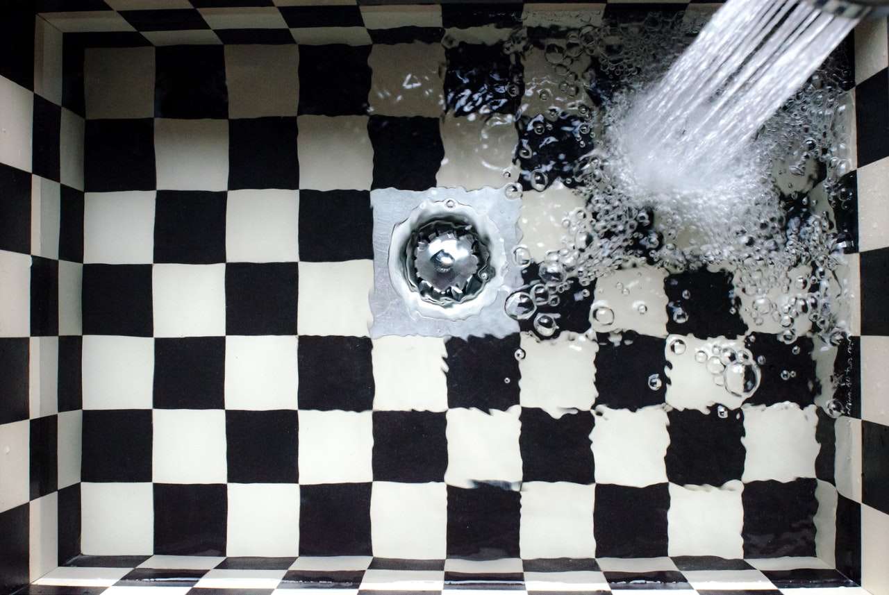 You Have a Clogged Drain. When Is It Time to Call a Plumber?