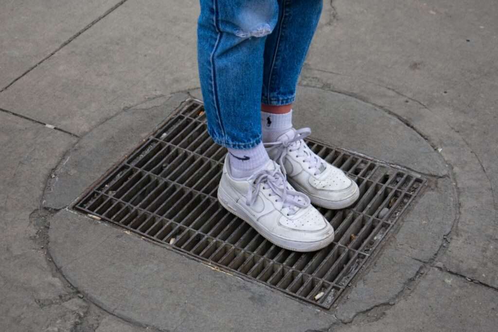 woman on drain