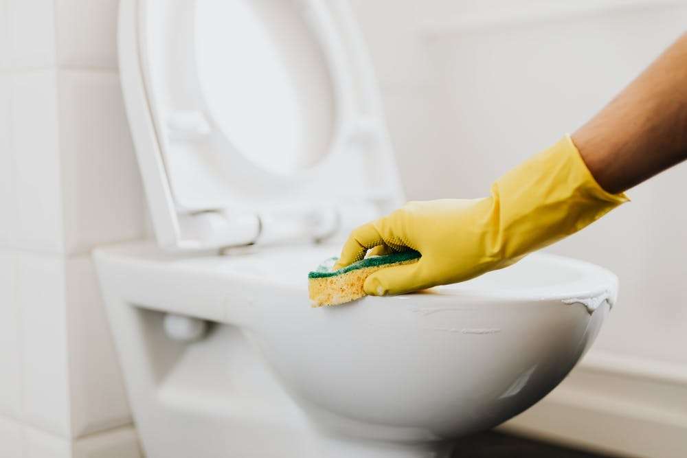 cleaning toilet